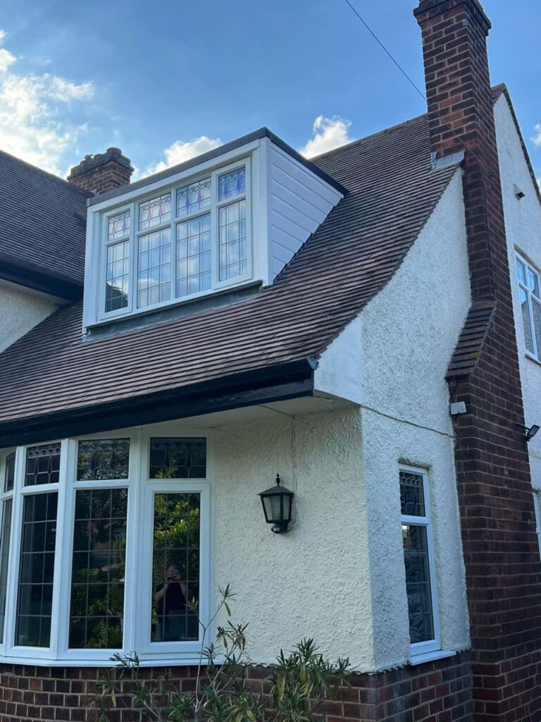 This is a photo of a dormer window which has just had some repairs carried out where the roof and the dormer meet. Works carried out by LS Roofing Beaconsfield